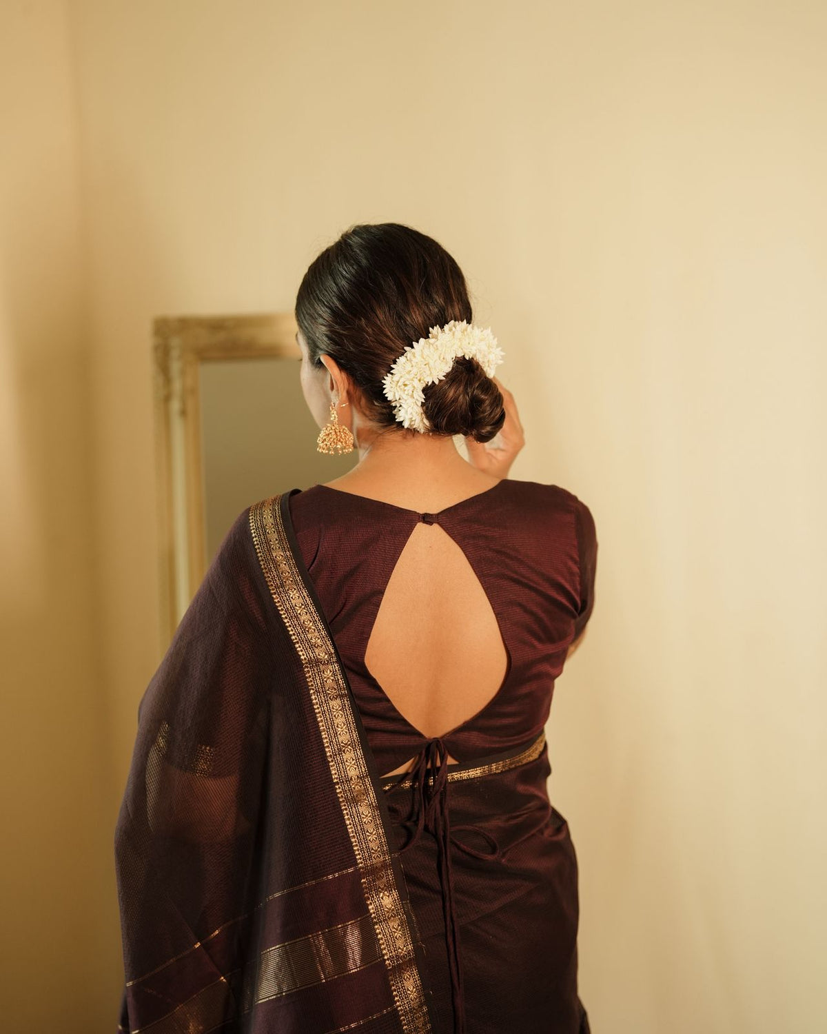 Mahogany Maheshwari saree with zari border and zari lines on pallu
