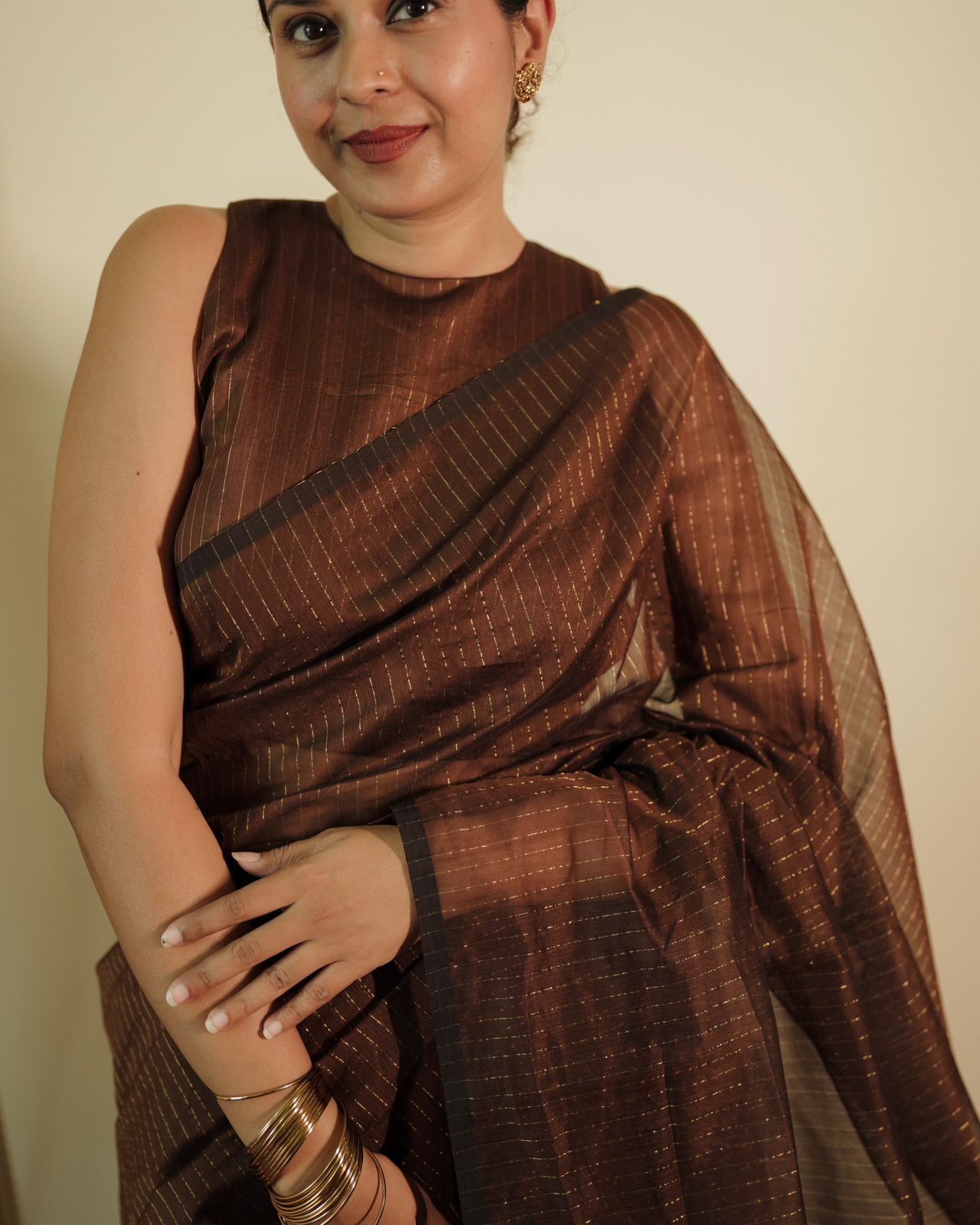 Chocolate brown Maheshwari saree with zari lines all over