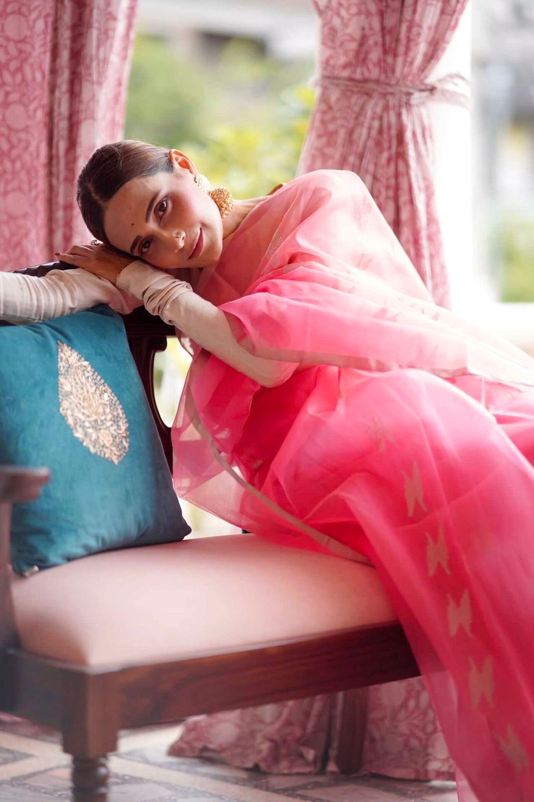 Peachish pink Chanderi organza silk with feather motifs all over
