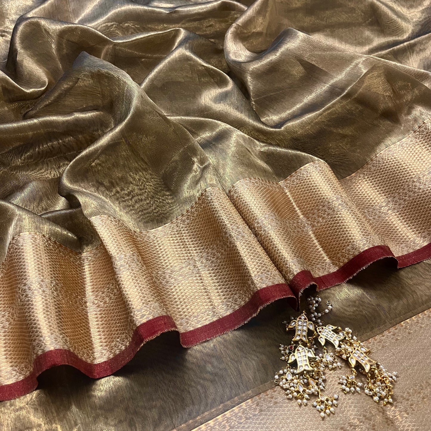 Antique gold and red Maheshwari tissue silk saree with zari pattern on pallu