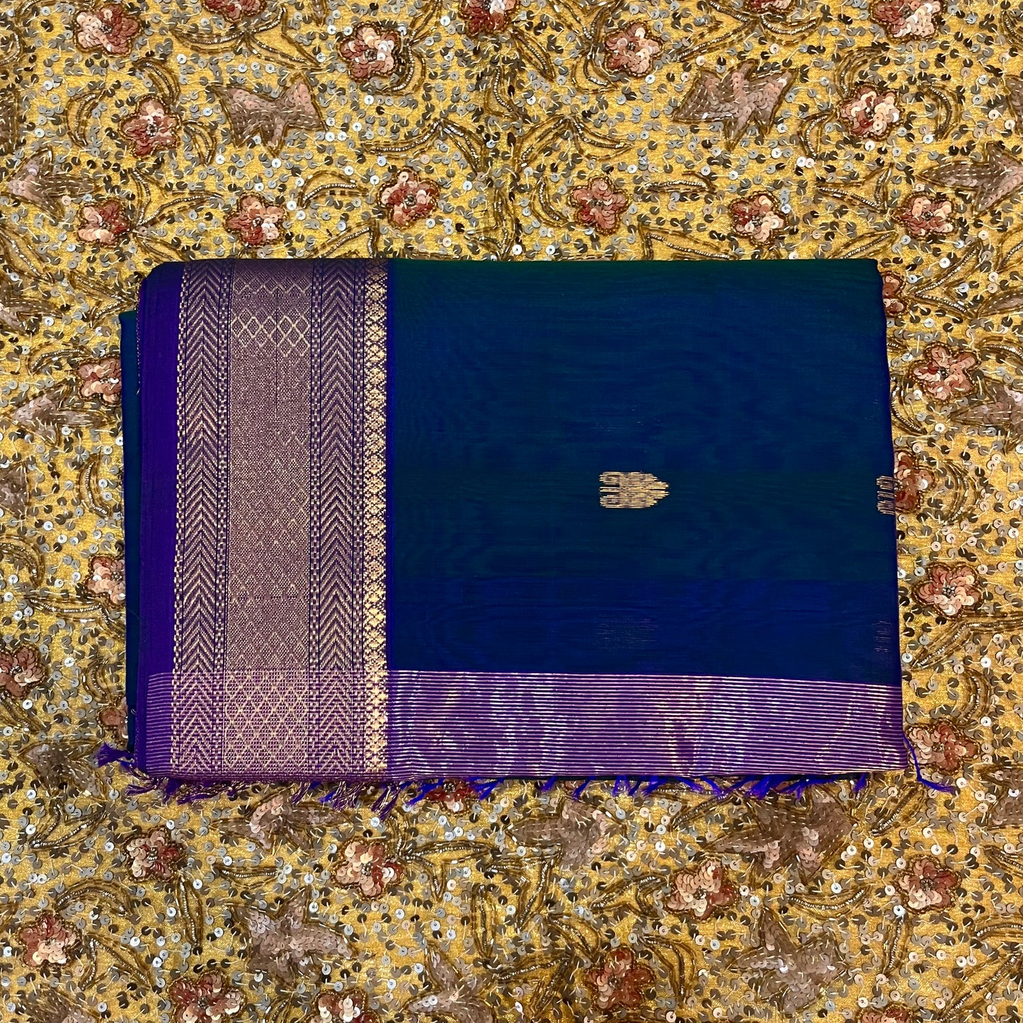 Peacock and purple dual tone Maheshwari saree with zari motifs all over