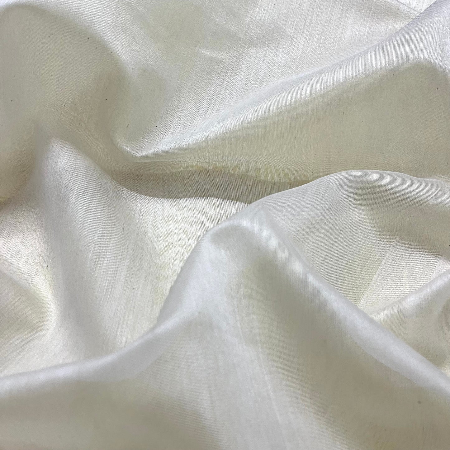 White and lemon Chanderi saree with zari lines on pallu