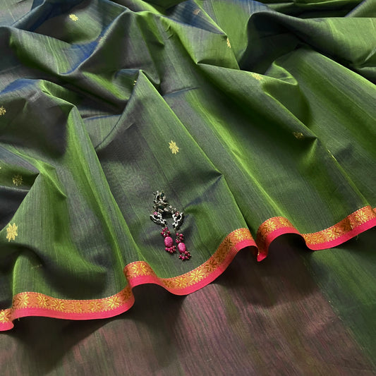 Green and pink Maheshwari saree with flower bootis all over