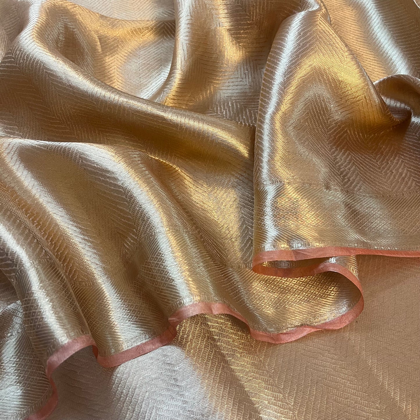 Champagne gold Banarasi silk saree with zari pattern all over