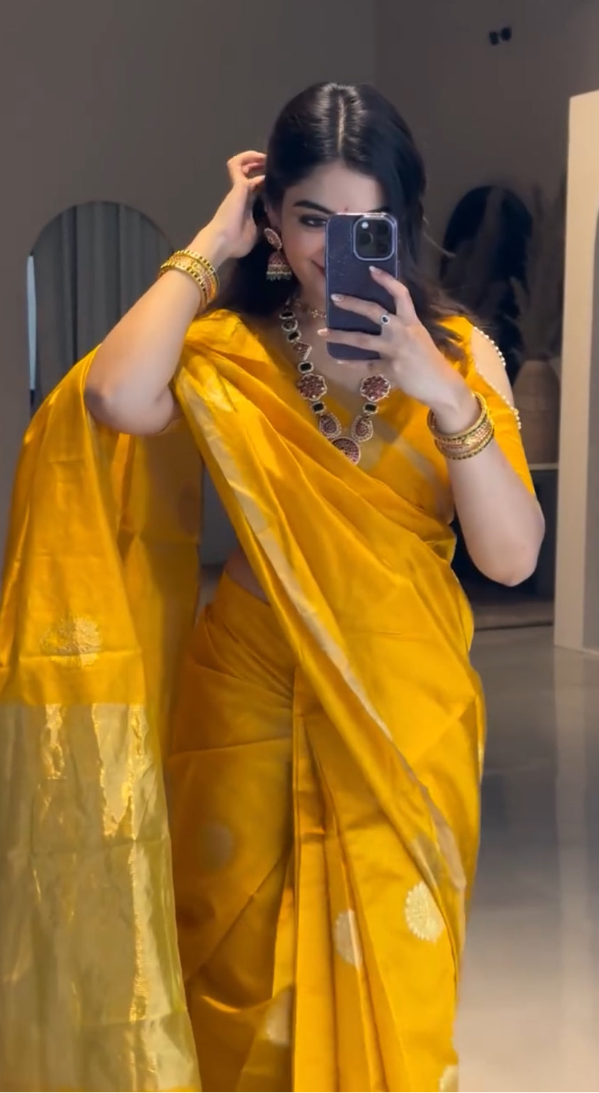 Yellow chanderi silk saree with mor motifs all over
