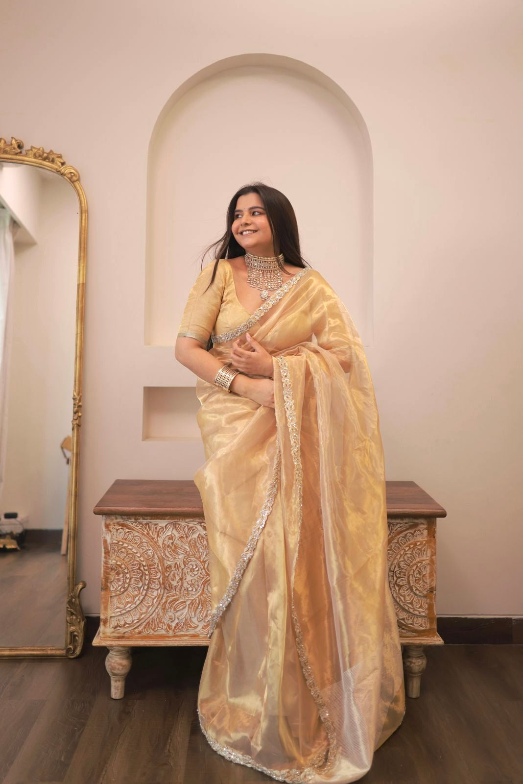 Molten gold chanderi tissue silk saree with intricate work border