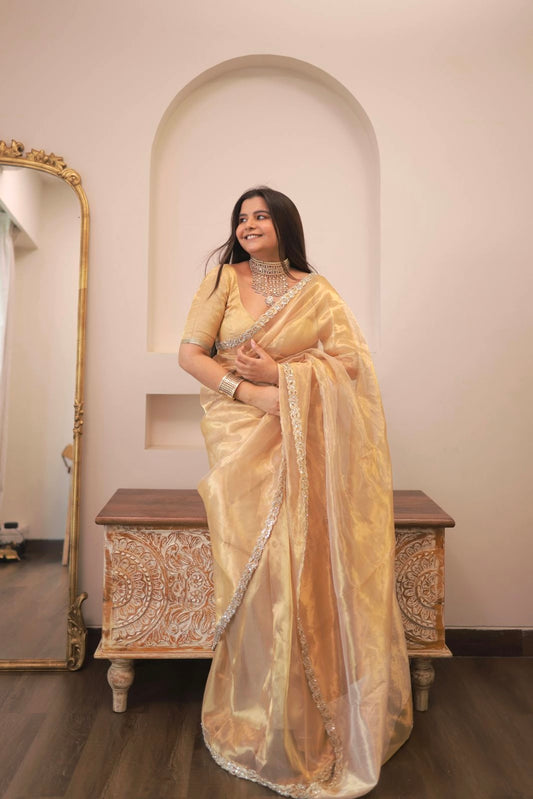Molten gold chanderi tissue silk saree with intricate work border