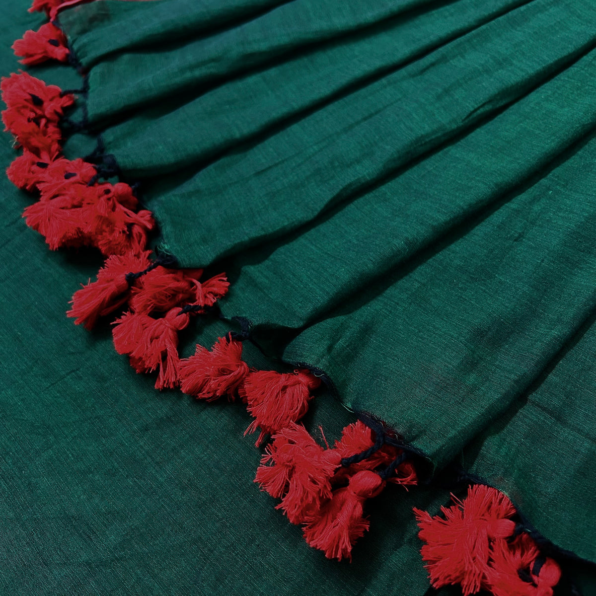 Dark green and red mulmul saree