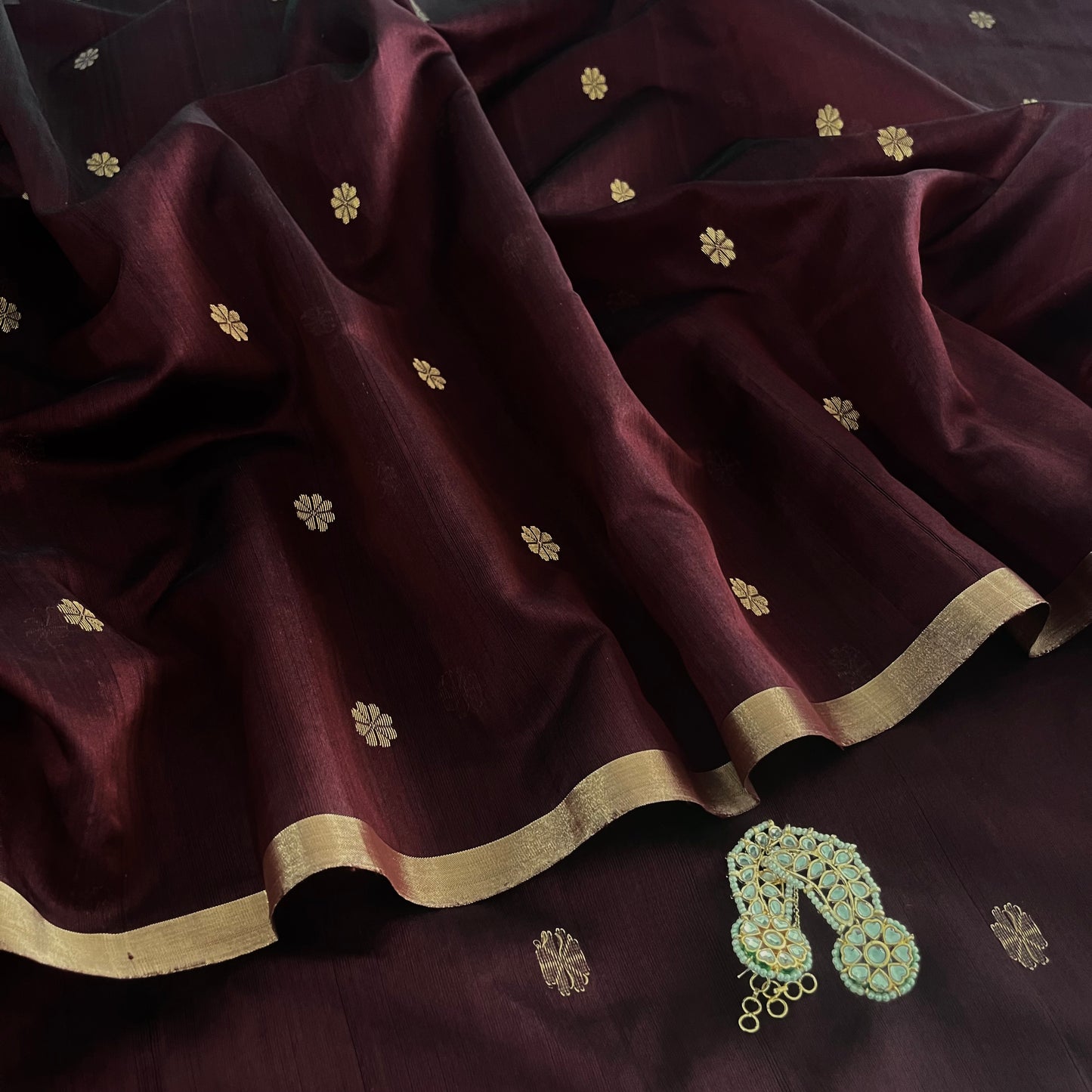 Mahogany Chanderi silk saree with flower bootis all over