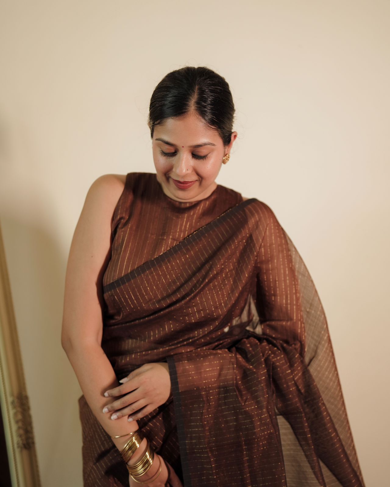 Chocolate brown Maheshwari saree with zari lines all over
