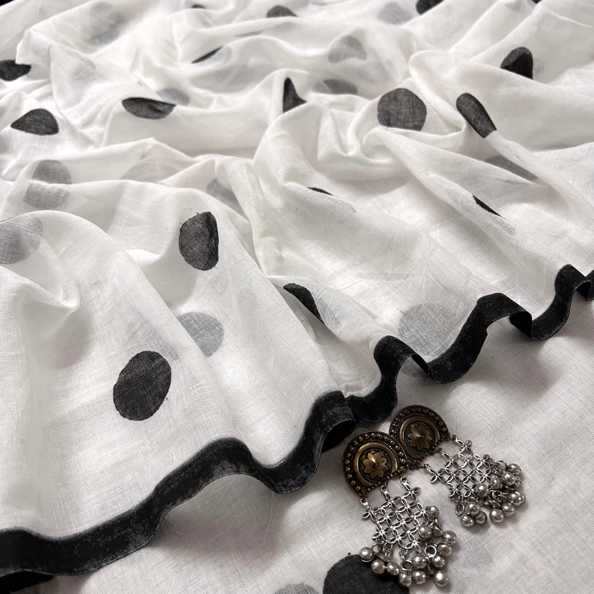 White and black polka dots mulmul saree