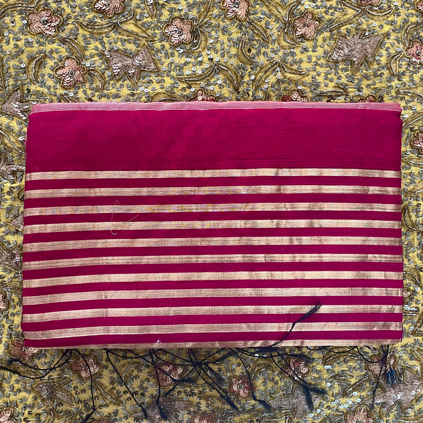 Dark pink Maheshwari saree with zari stripes all over