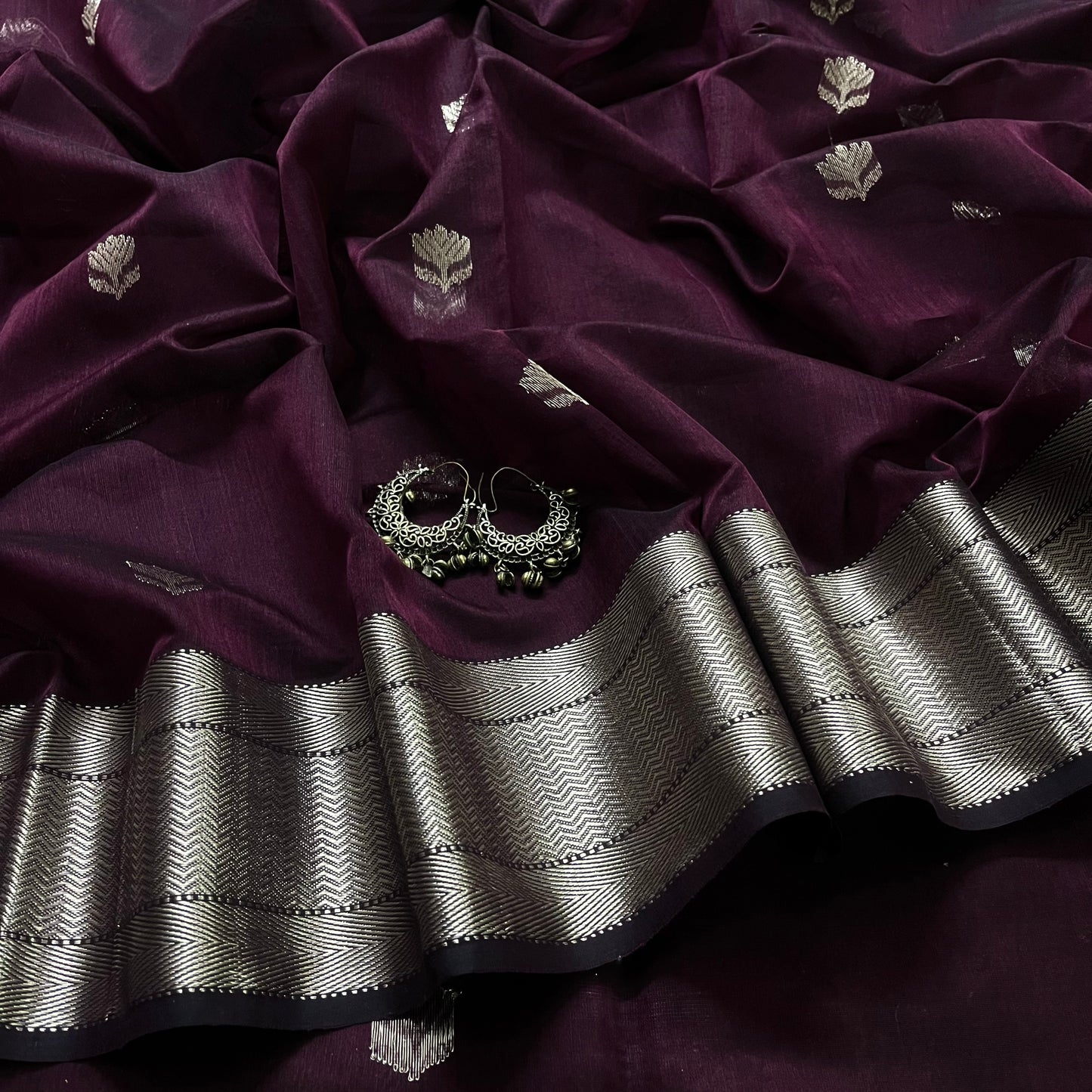 Deep wine Maheshwari saree with flower motifs all over