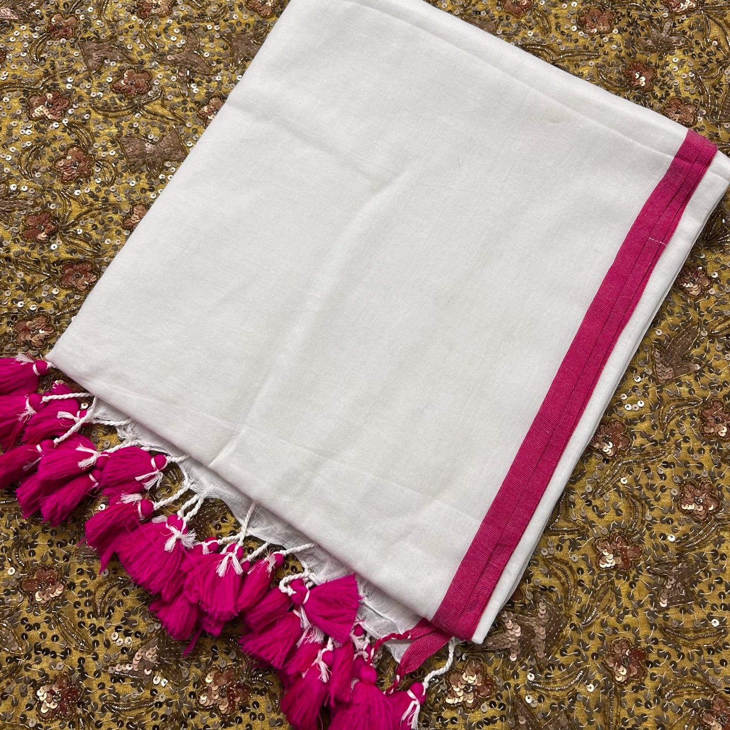 White and pink mulmul saree
