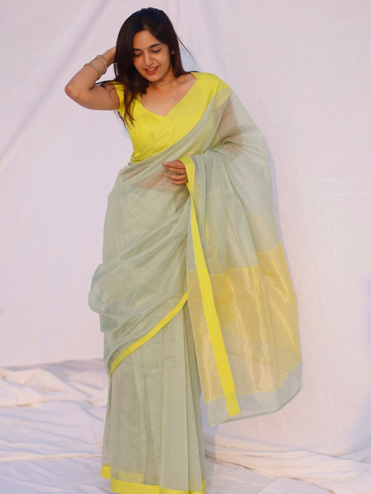 Sage and lemon Chanderi saree with zari lines on pallu