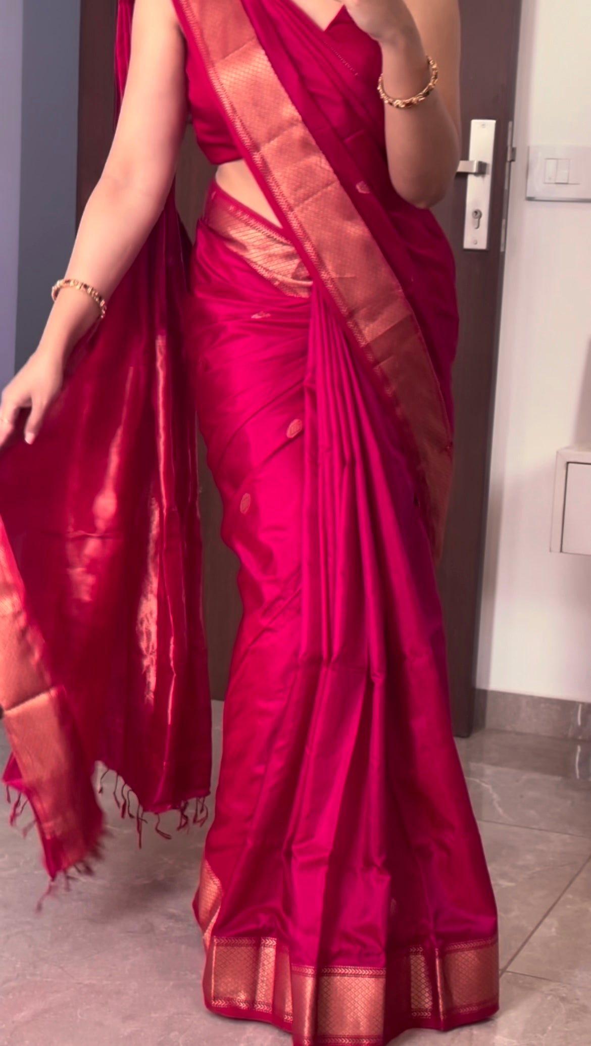 Rani pink Maheshwari silk saree with zari bootis all over