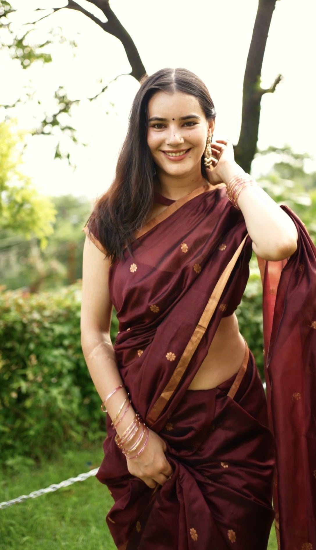 Mahogany Chanderi silk saree with flower bootis all over