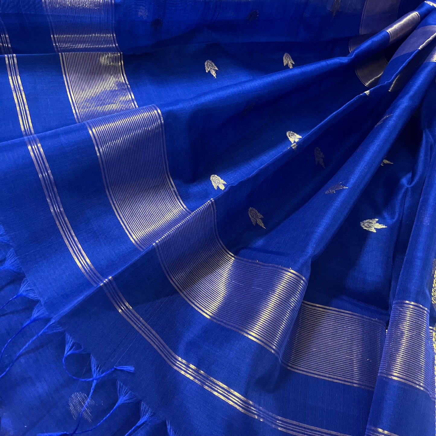 Cobalt blue Maheshwari saree with flower bootis all over
