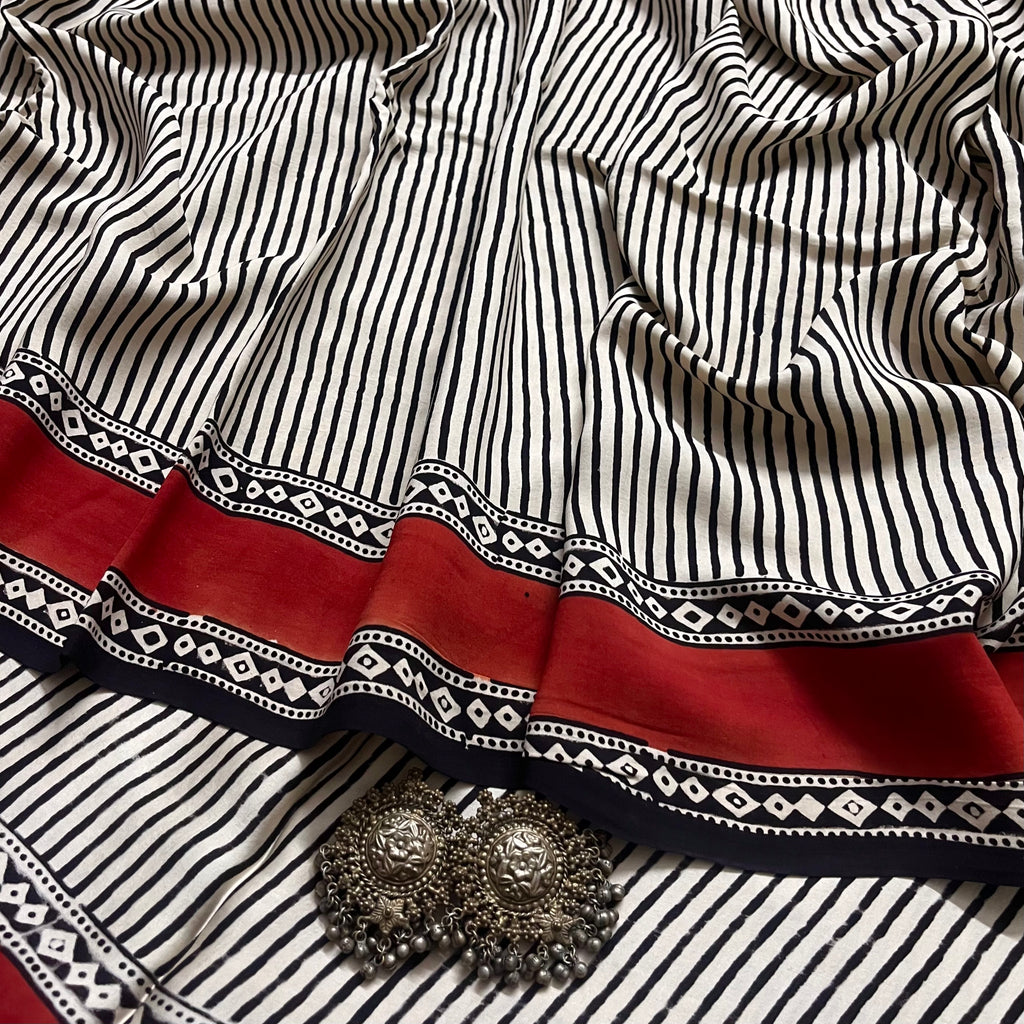 White and black silk saree with block print all over