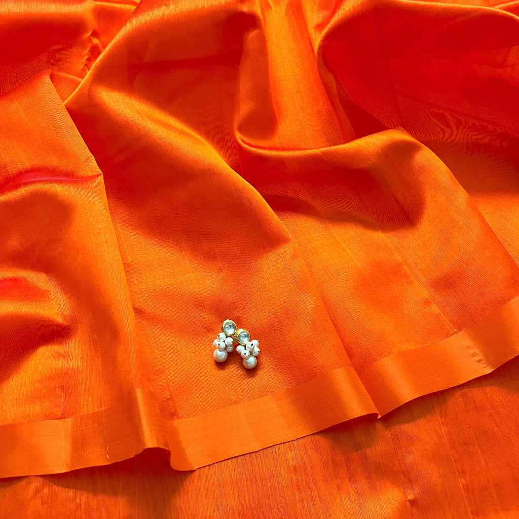 Sunset orange chanderi silk saree with silk border