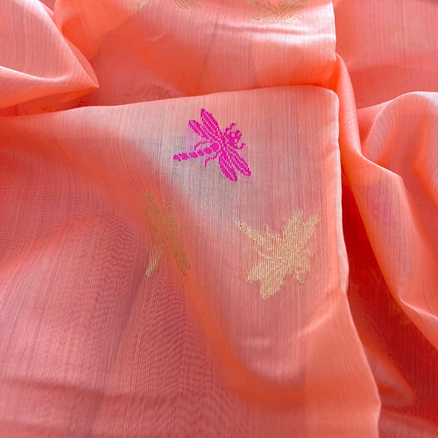 Peachish pink Chanderi silk saree with dragonfly motifs all over