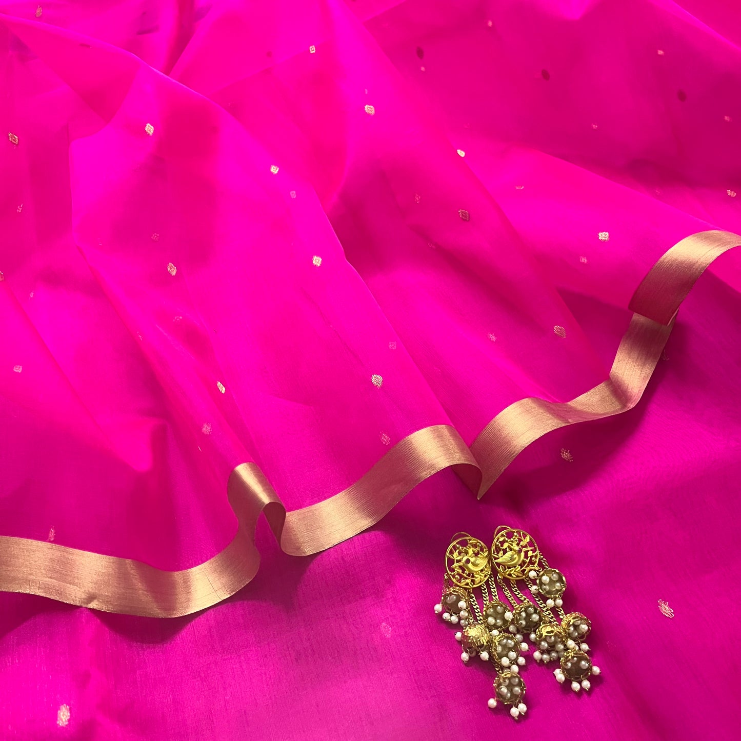 Fuschia pink Chanderi silk saree with zari bootis all over