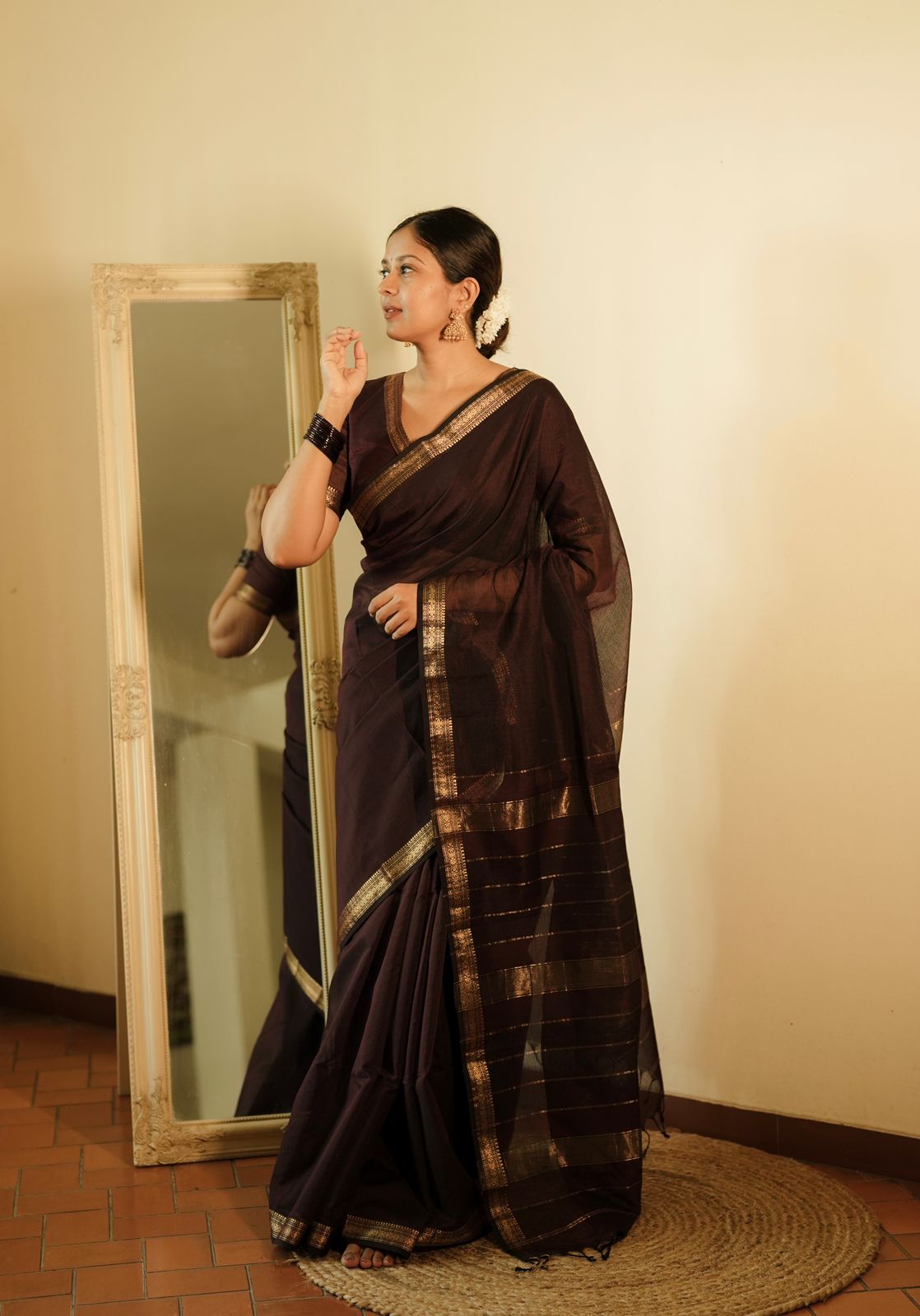 Mahoganay Maheshwari saree with zari border and zari lines on pallu