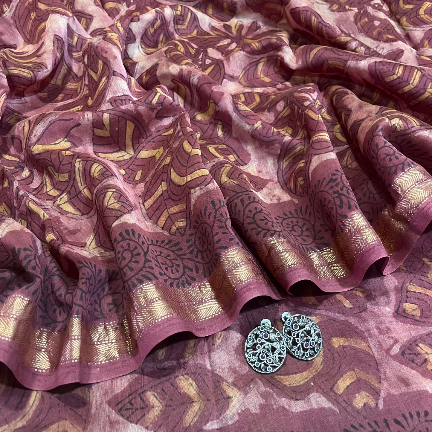 Rust pink Maheshwari saree with ajrakh print all over