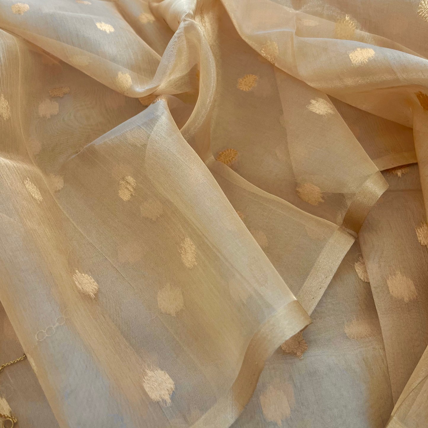 Gold Banarasi tissue silk saree with flower bootis all over