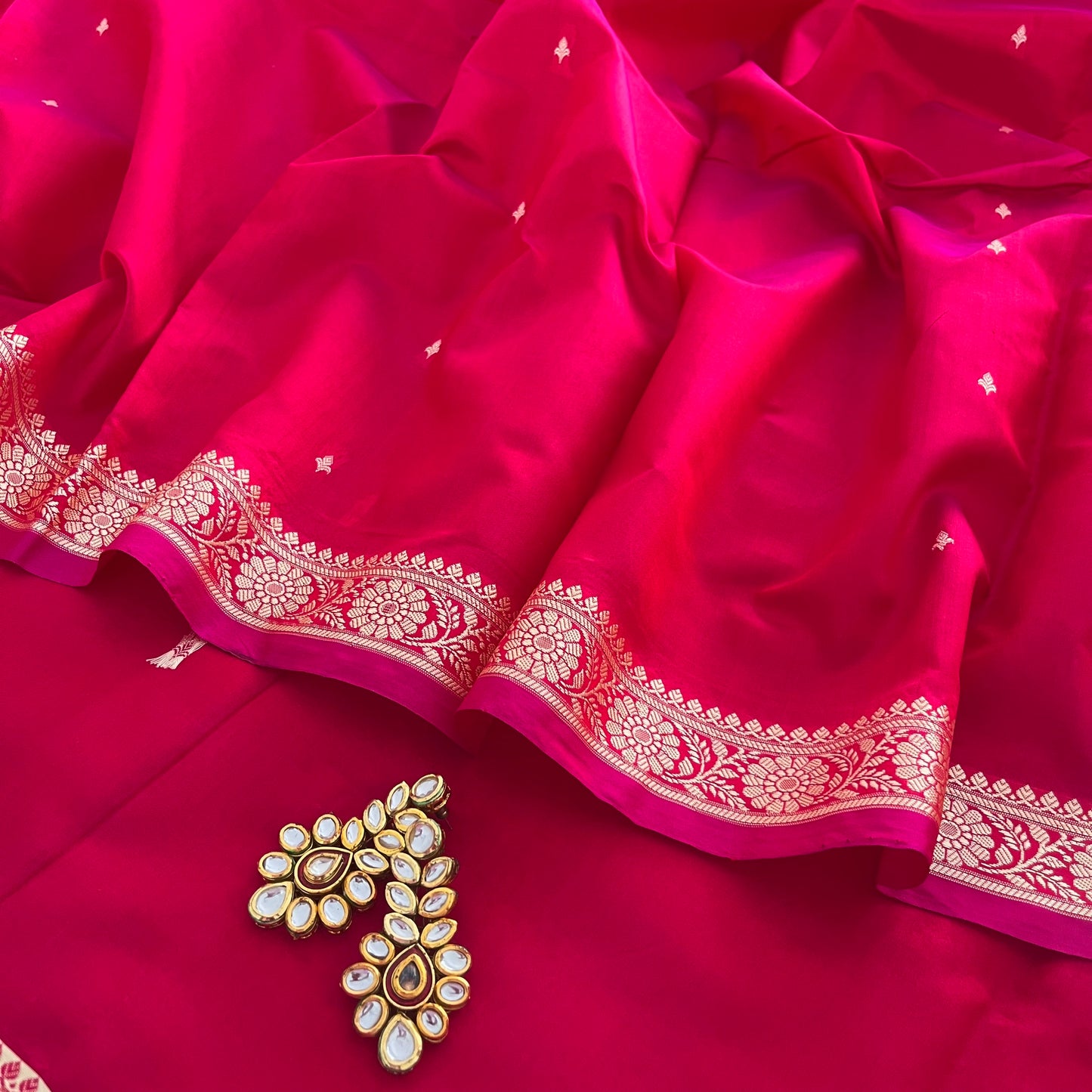 Pinkish Red dual tone Banarasi silk saree with resham bootis all over