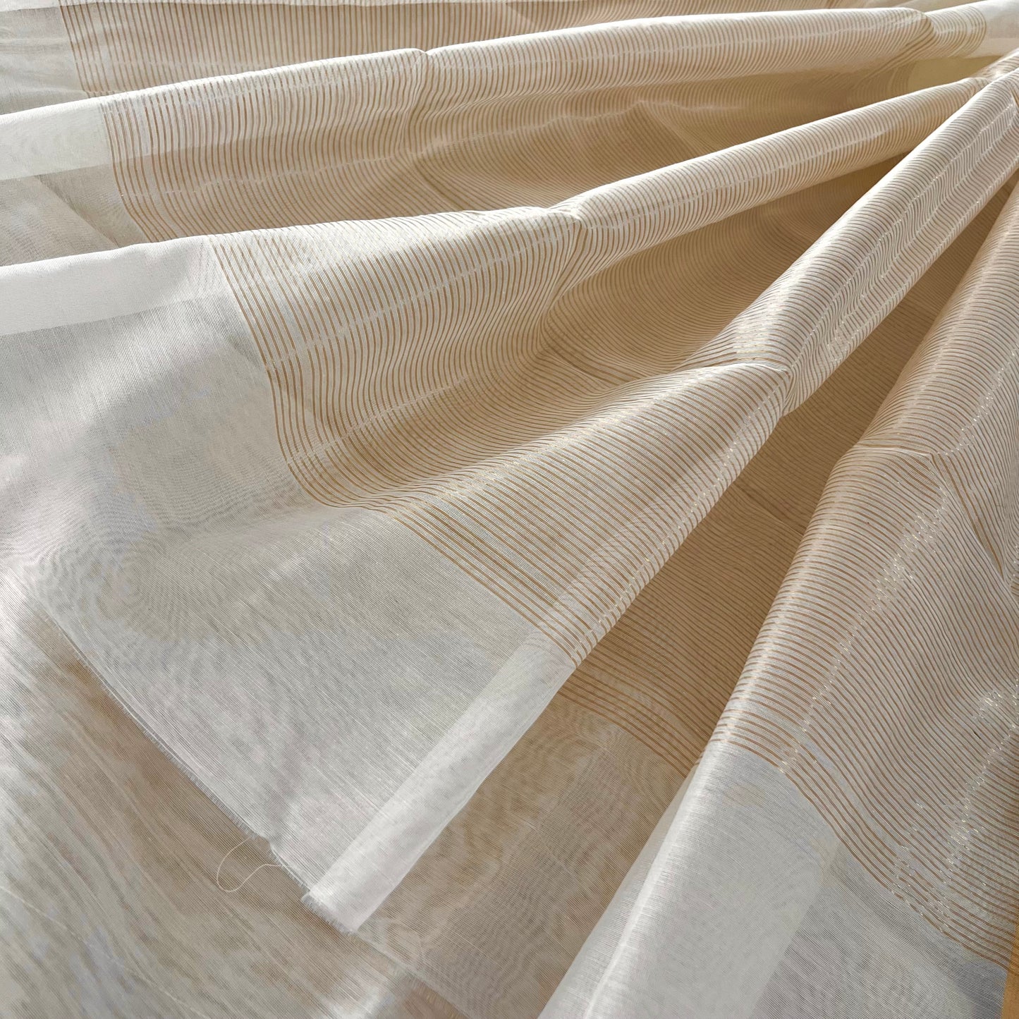 Off white Chanderi saree with zari border