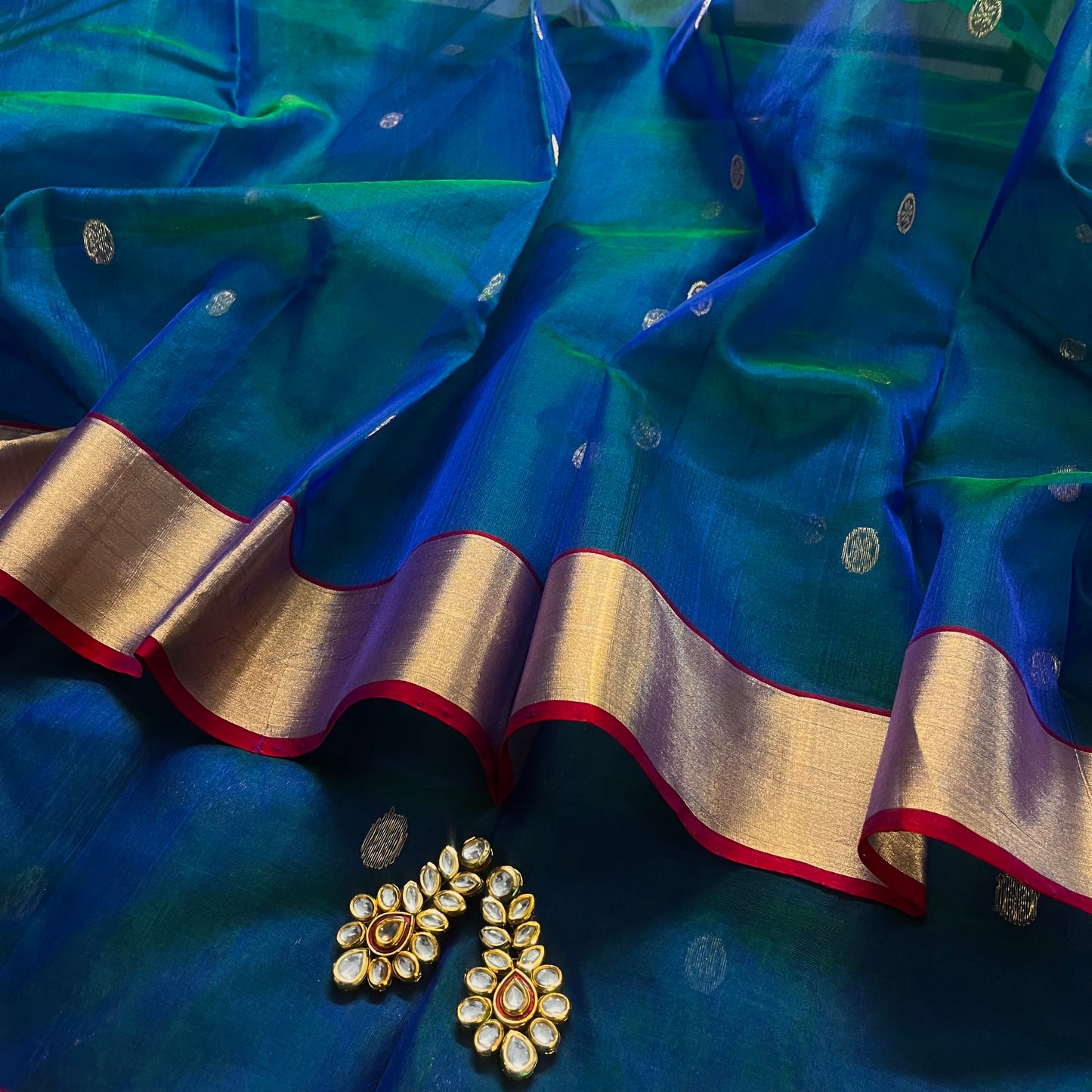 Peacock blue dual tone Chanderi silk saree with zari motifs on pallu