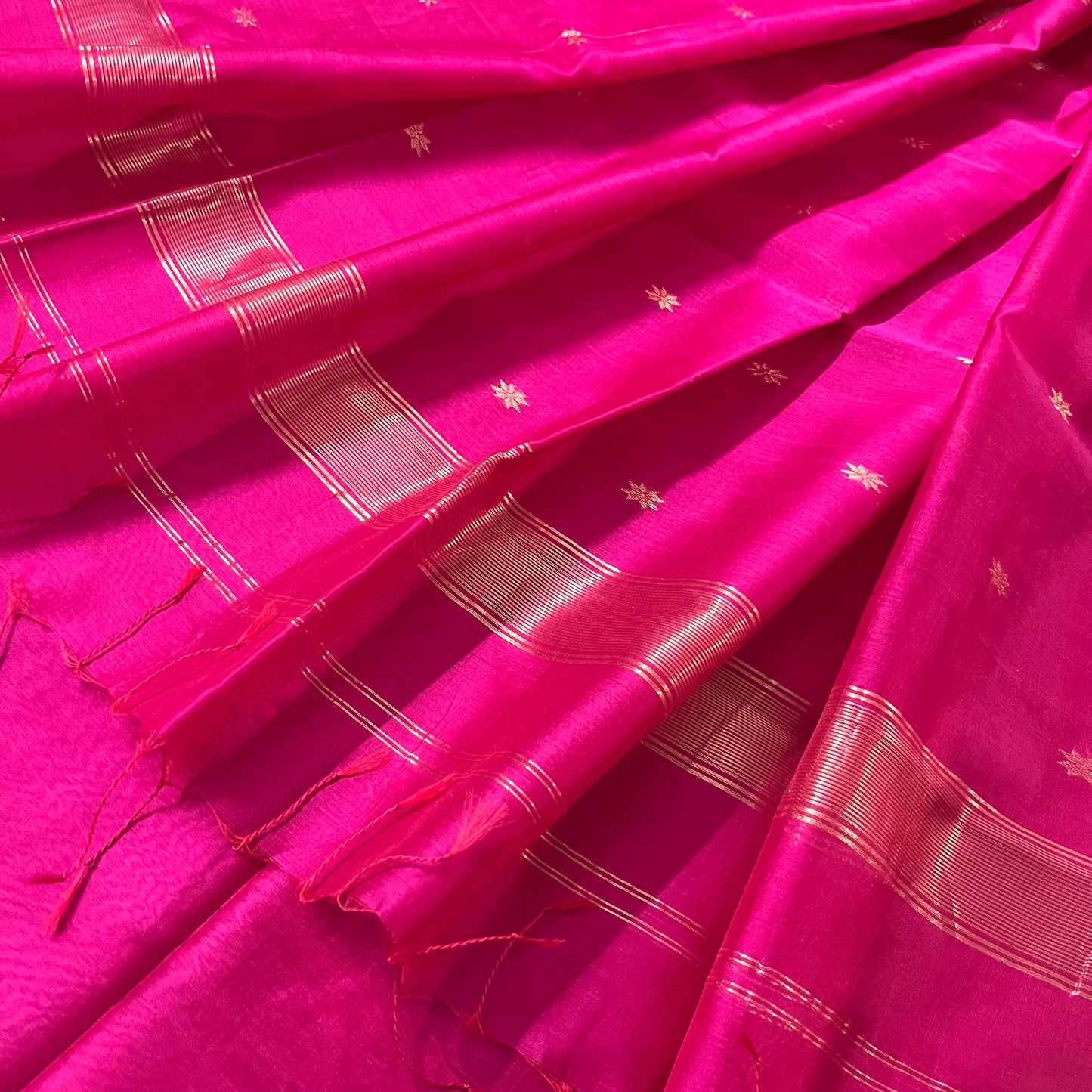 Pink Maheshwari saree with flower bootis all over