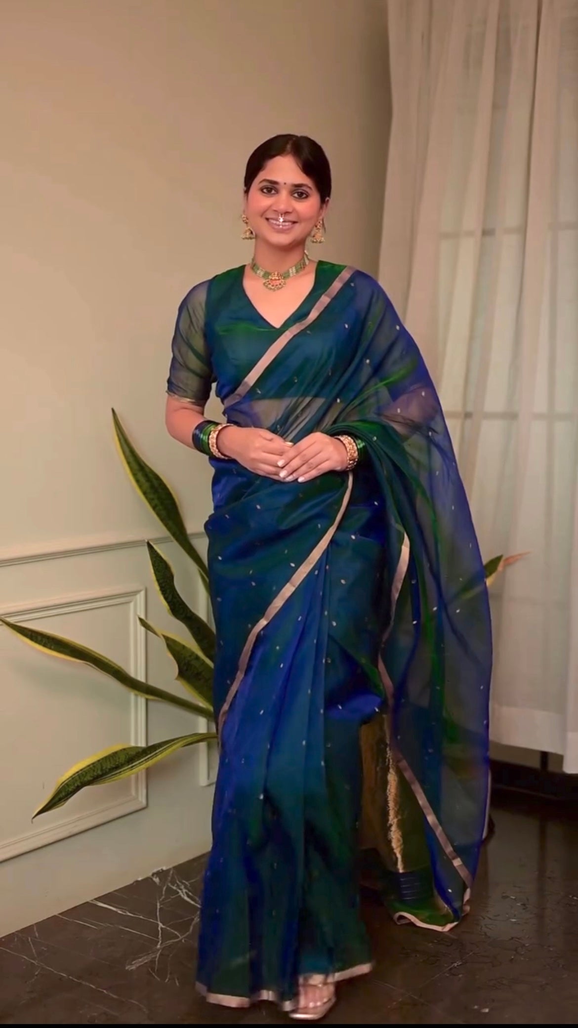 Peacock blue and green dual tone Chanderi organza silk saree with zari bootis all over