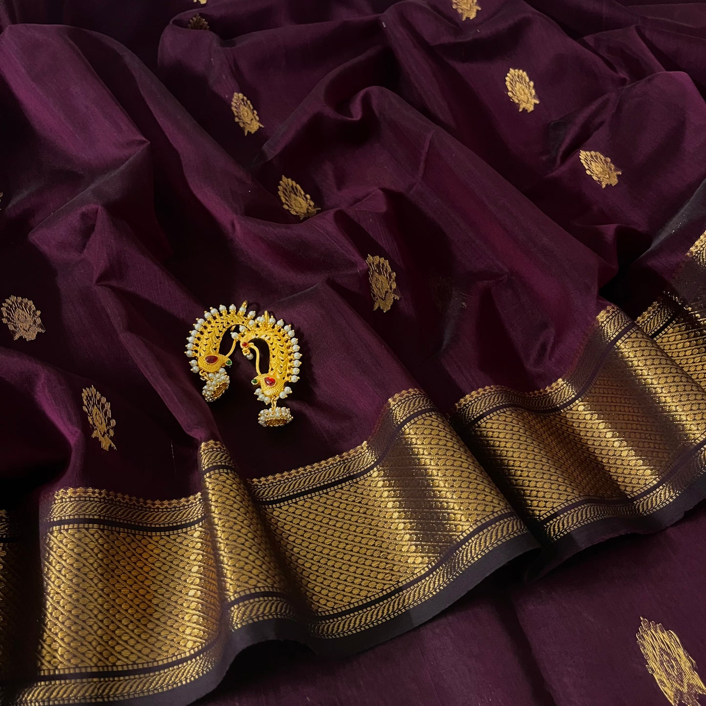 Deep wine Maheshwari saree with zari motifs all over