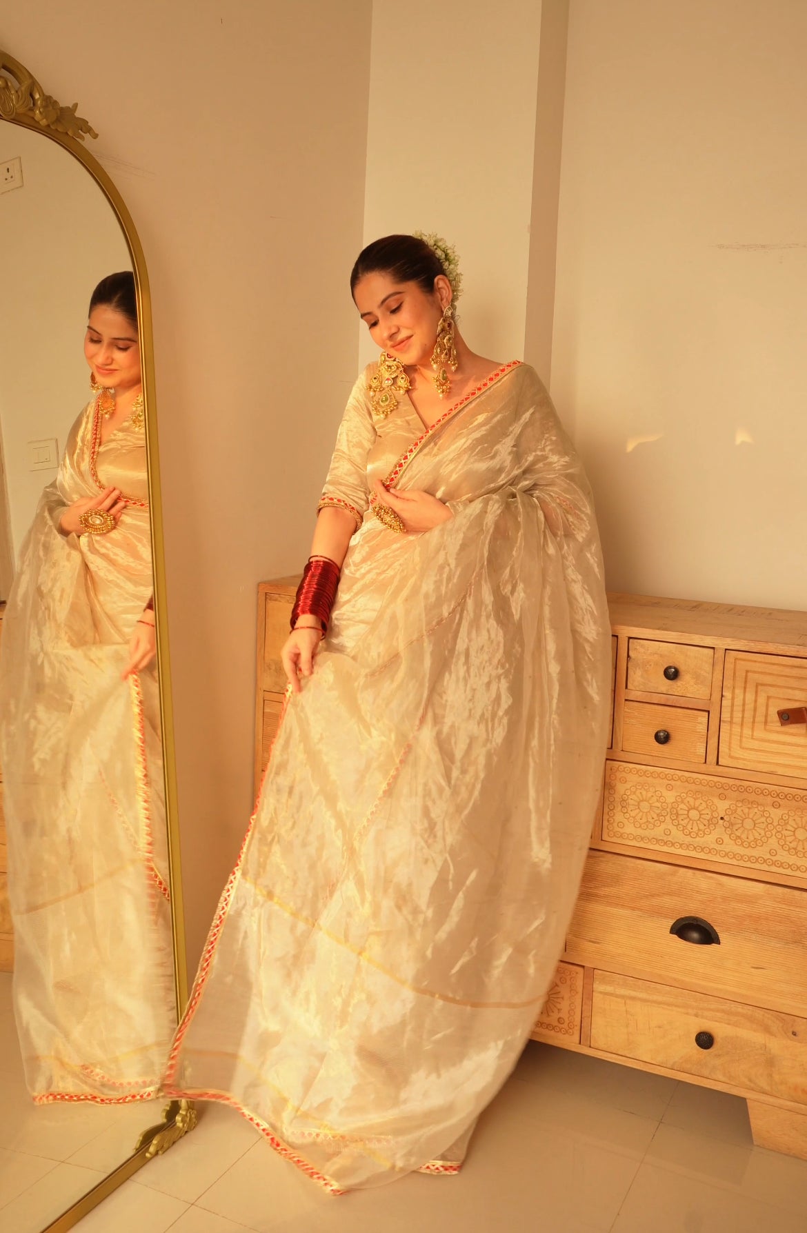 Chantilly cream and red Chanderi tissue silk saree with zari bootis all over