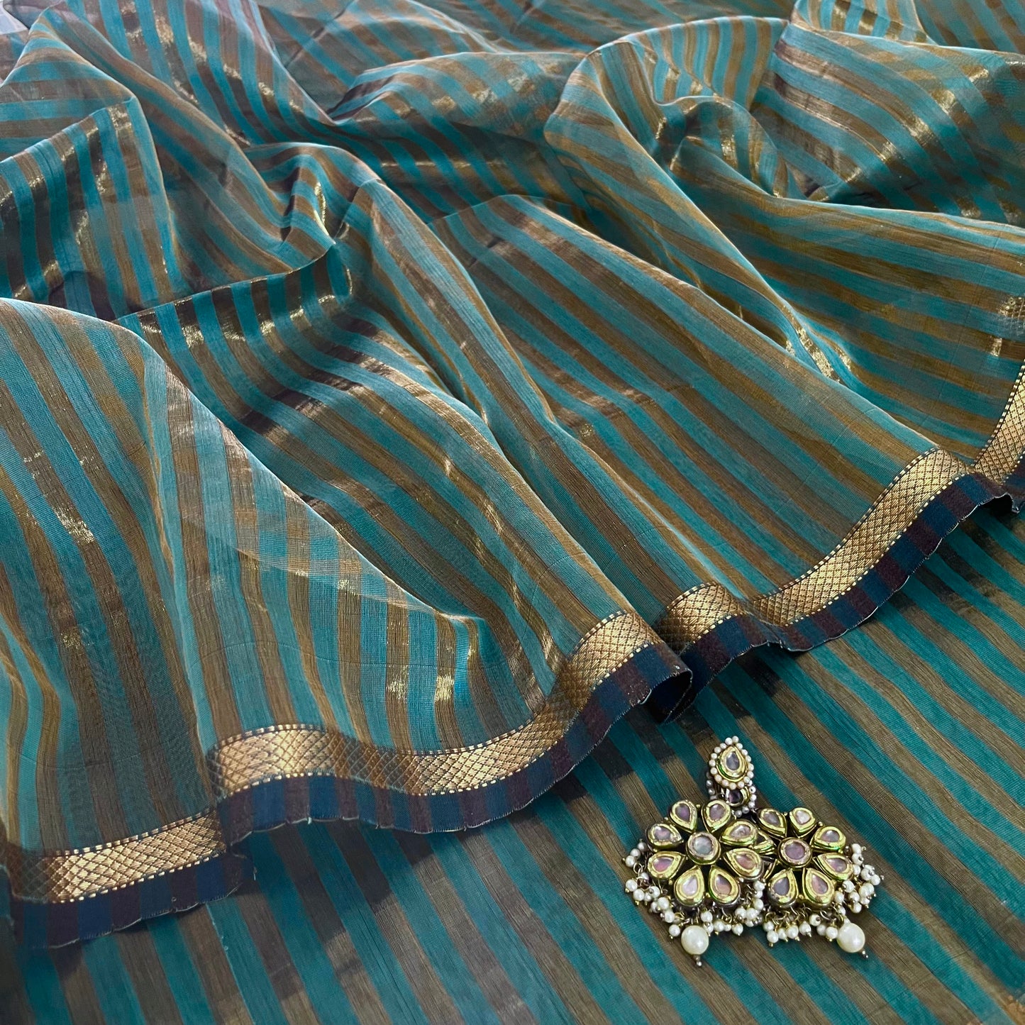 Baby blue Maheshwari saree with zari stripes all over