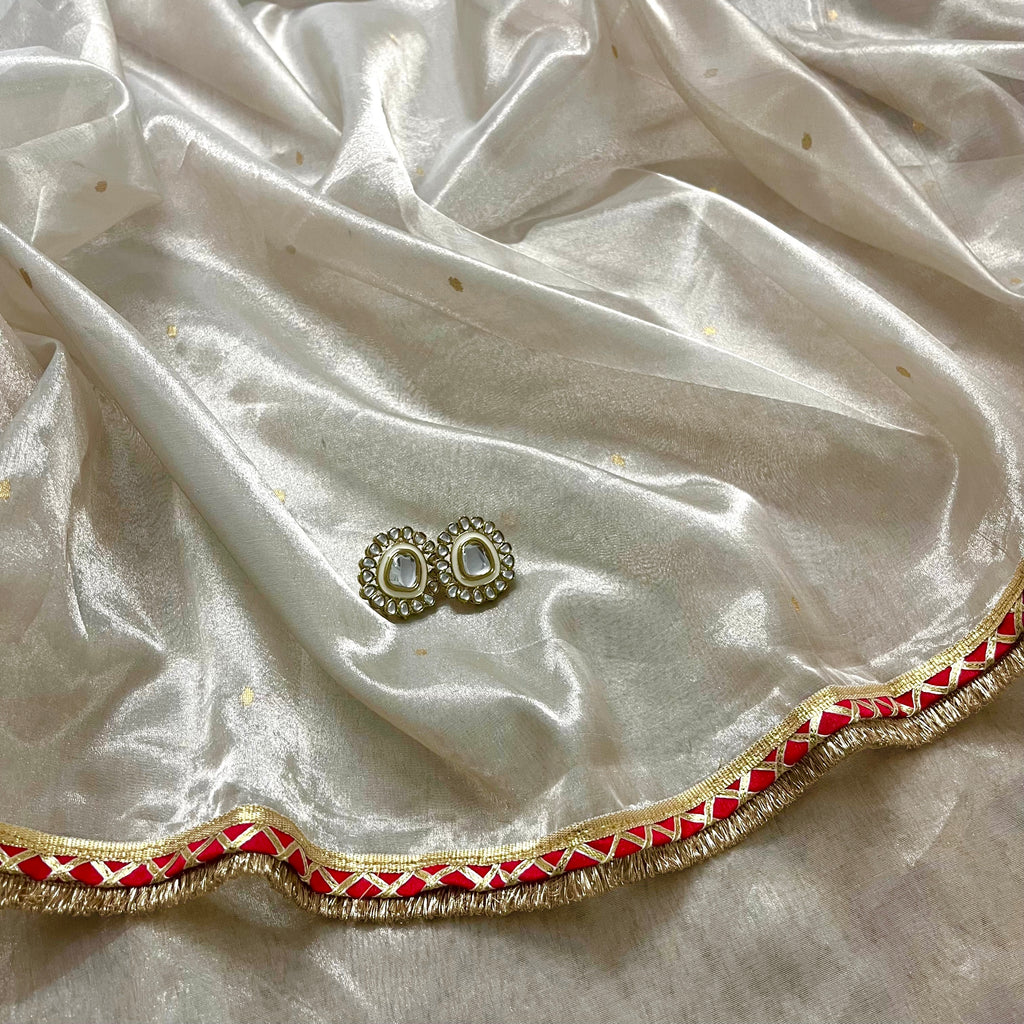 Chantilly cream and red Chanderi tissue silk saree with zari bootis all over