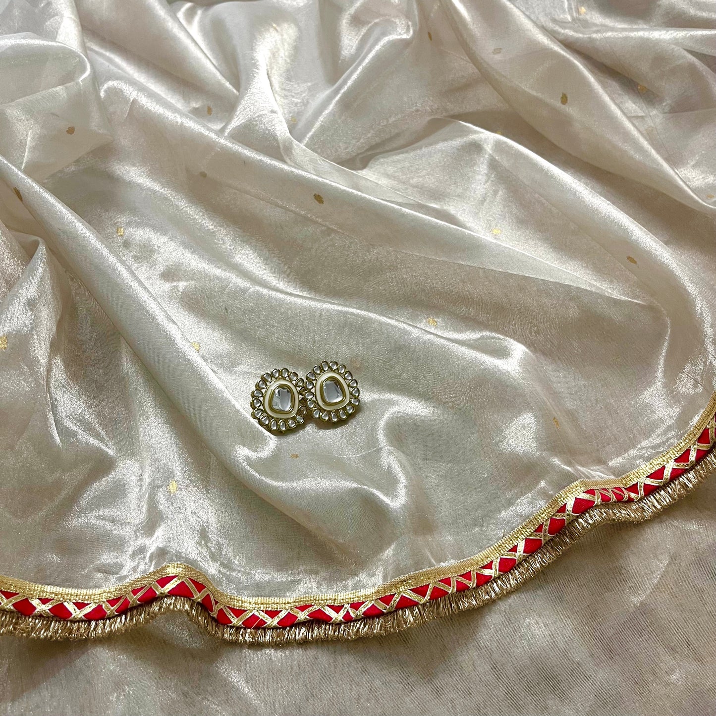 Chantilly cream and red Chanderi tissue silk saree with zari bootis all over