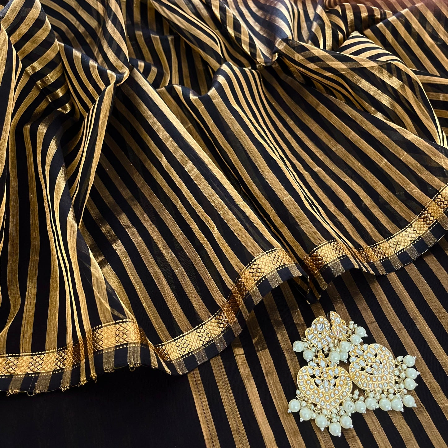 Black Maheshwari saree with zari stripes all over