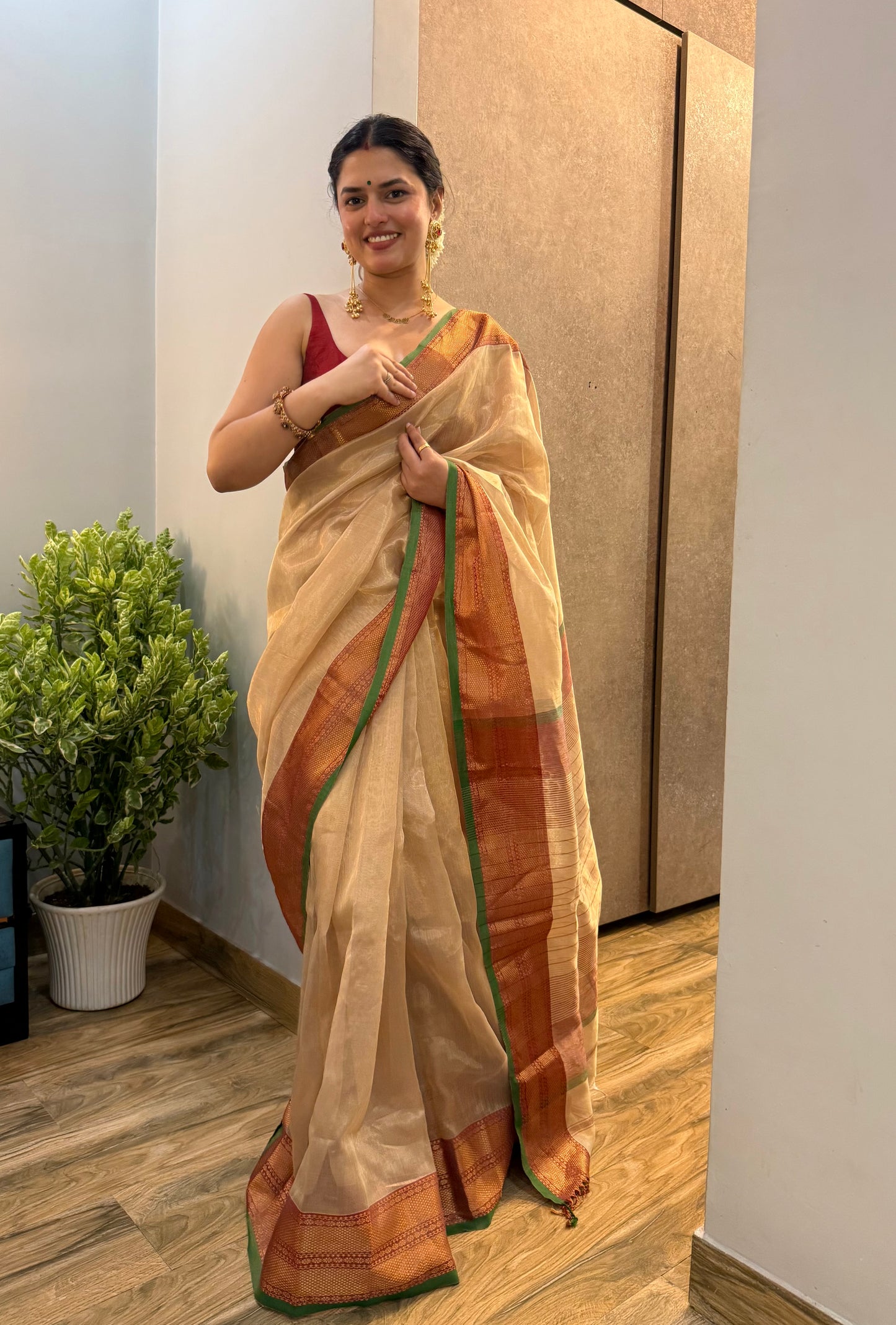 Gold Red & Green Maheshwari tissue saree with zari pattern on pallu
