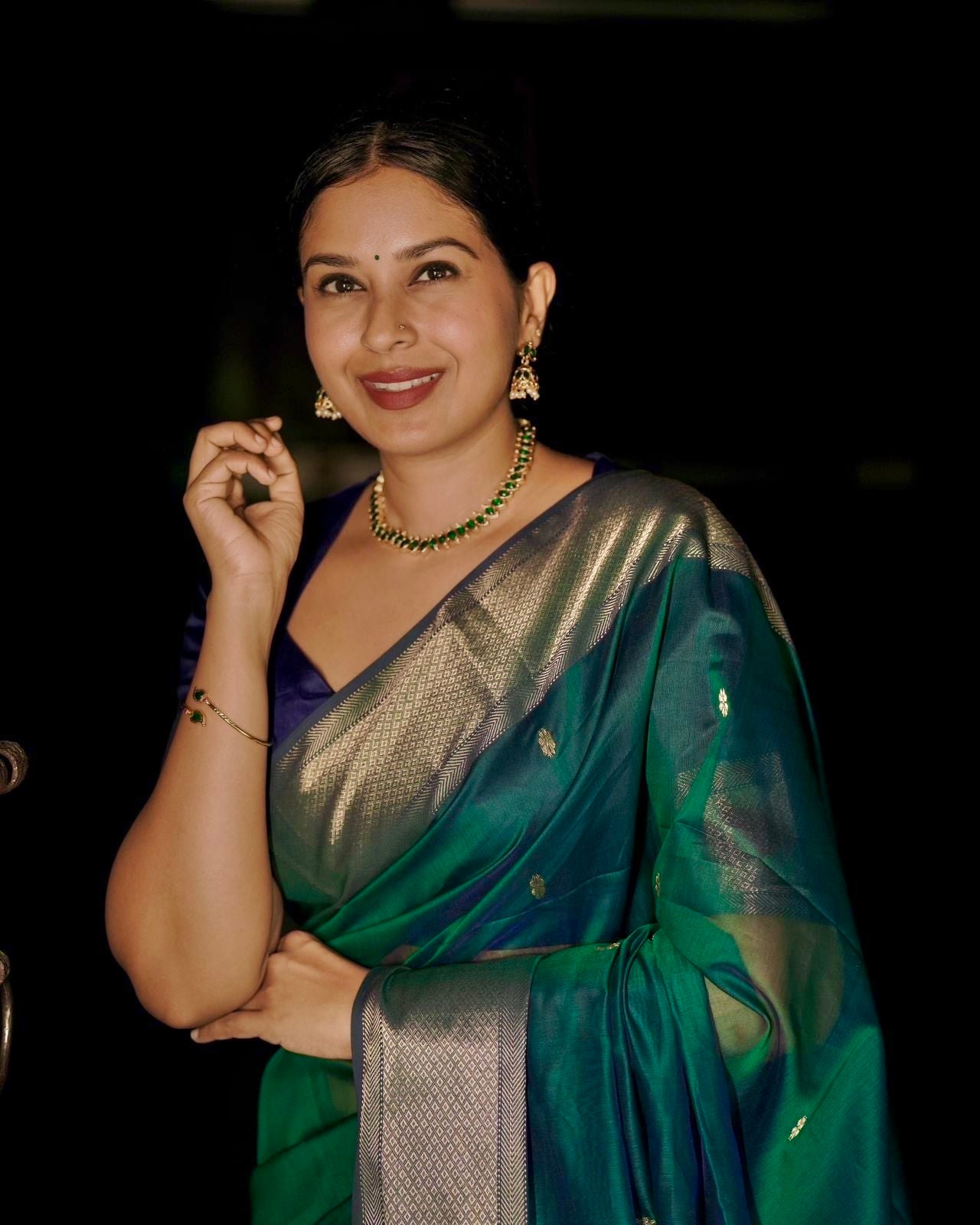 Dark Green and blue maheshwari dual tone saree with flower bootis all over