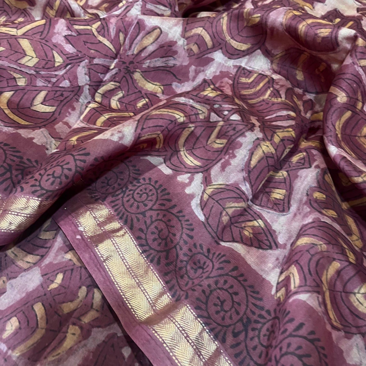 Rust pink Maheshwari saree with ajrakh print all over