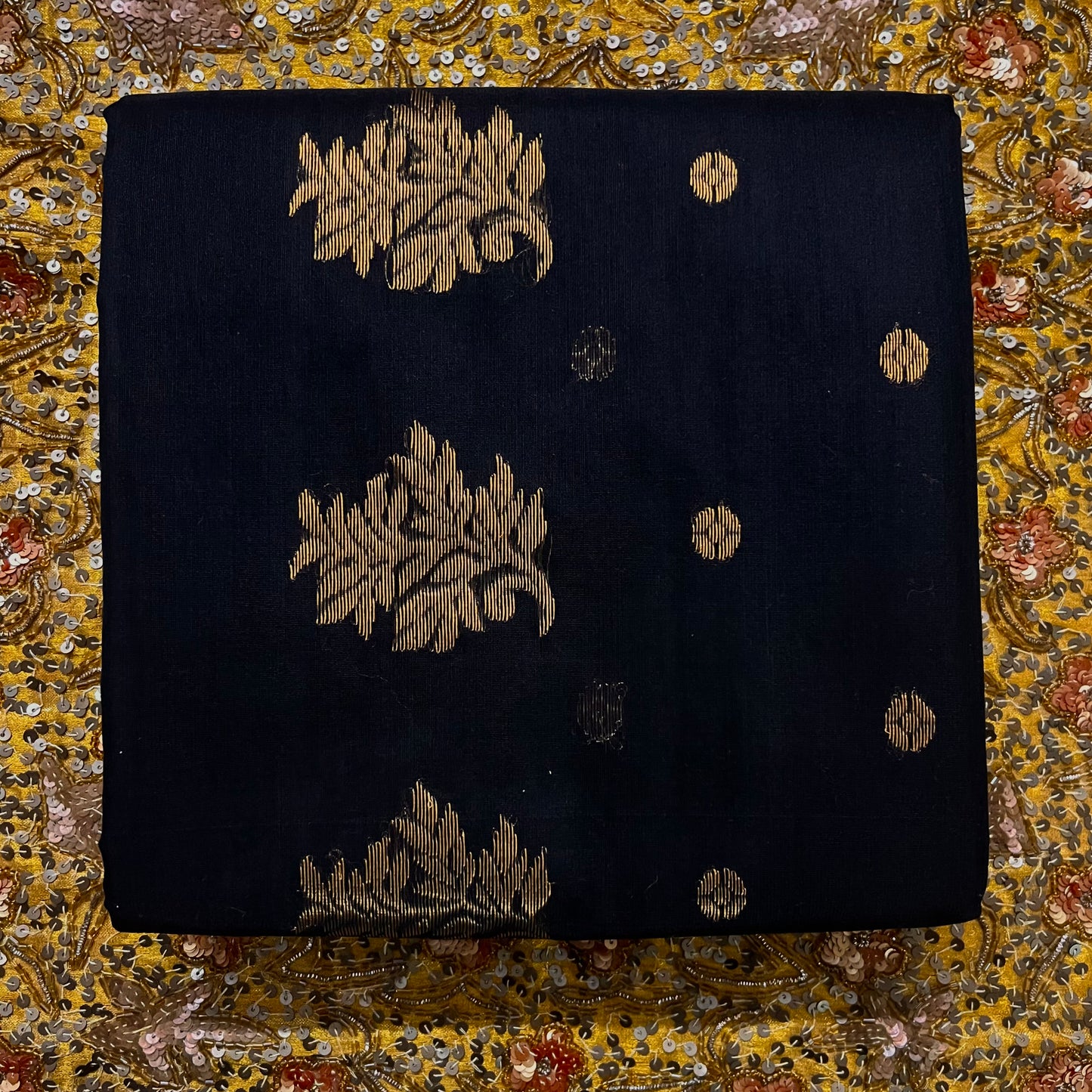 Black Chanderi saree with zari bootis all over and flower motifs on pallu