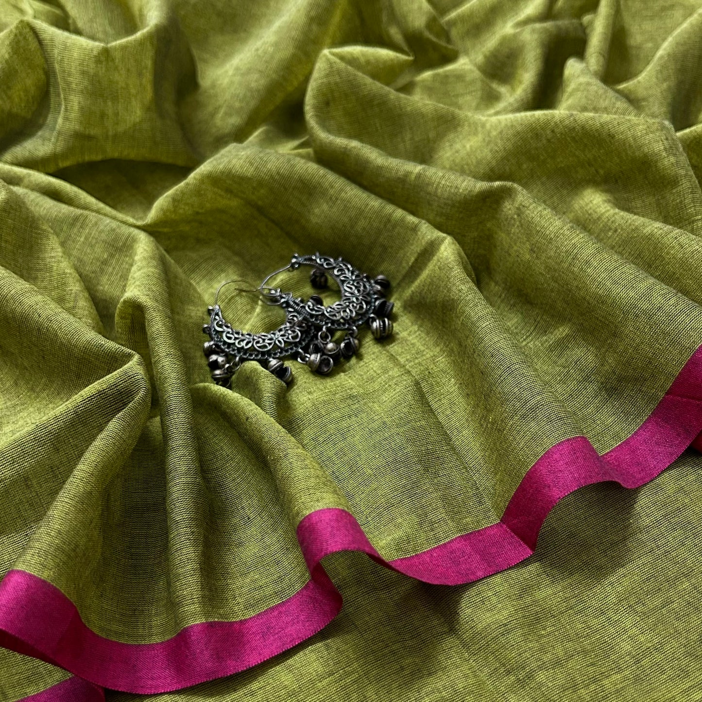 Olive green and pink mulmul saree