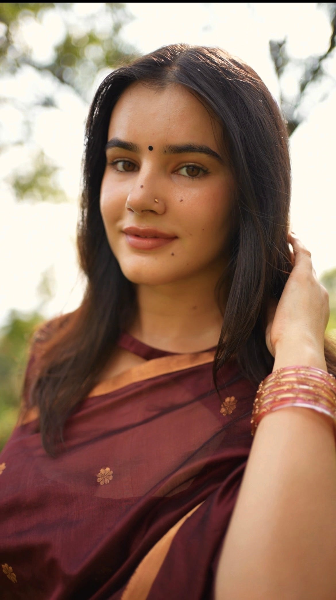 Mahogany Chanderi silk saree with flower bootis all over