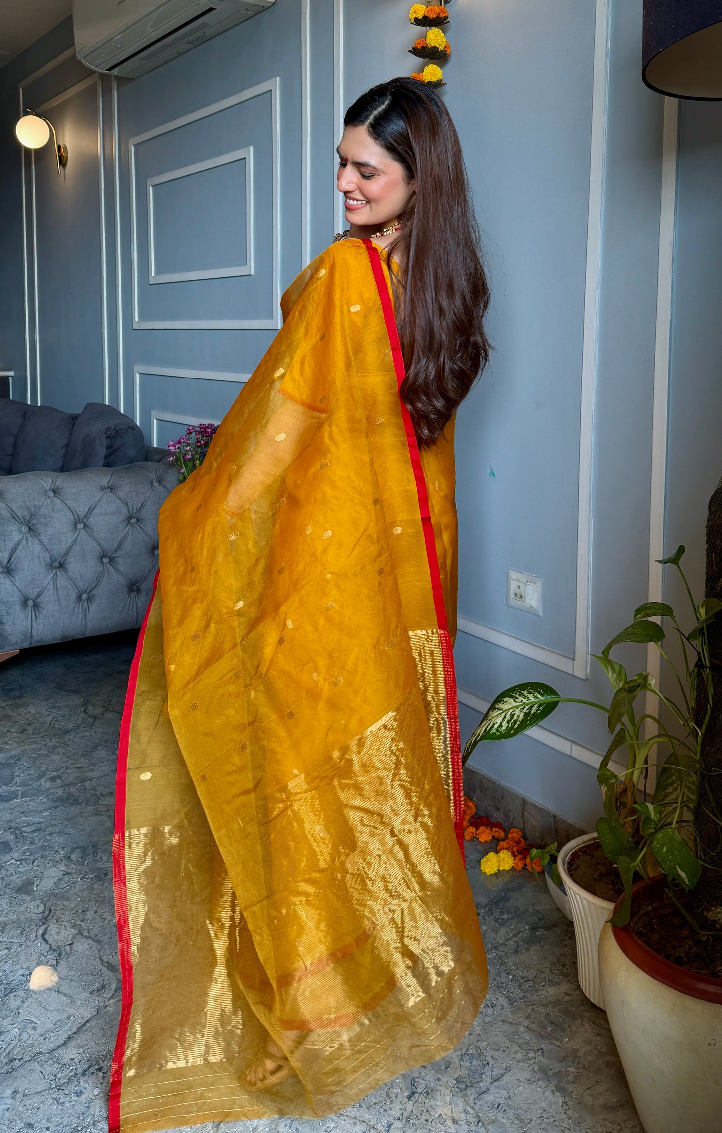 Mustard red Chanderi silk saree with zari bootis all over
