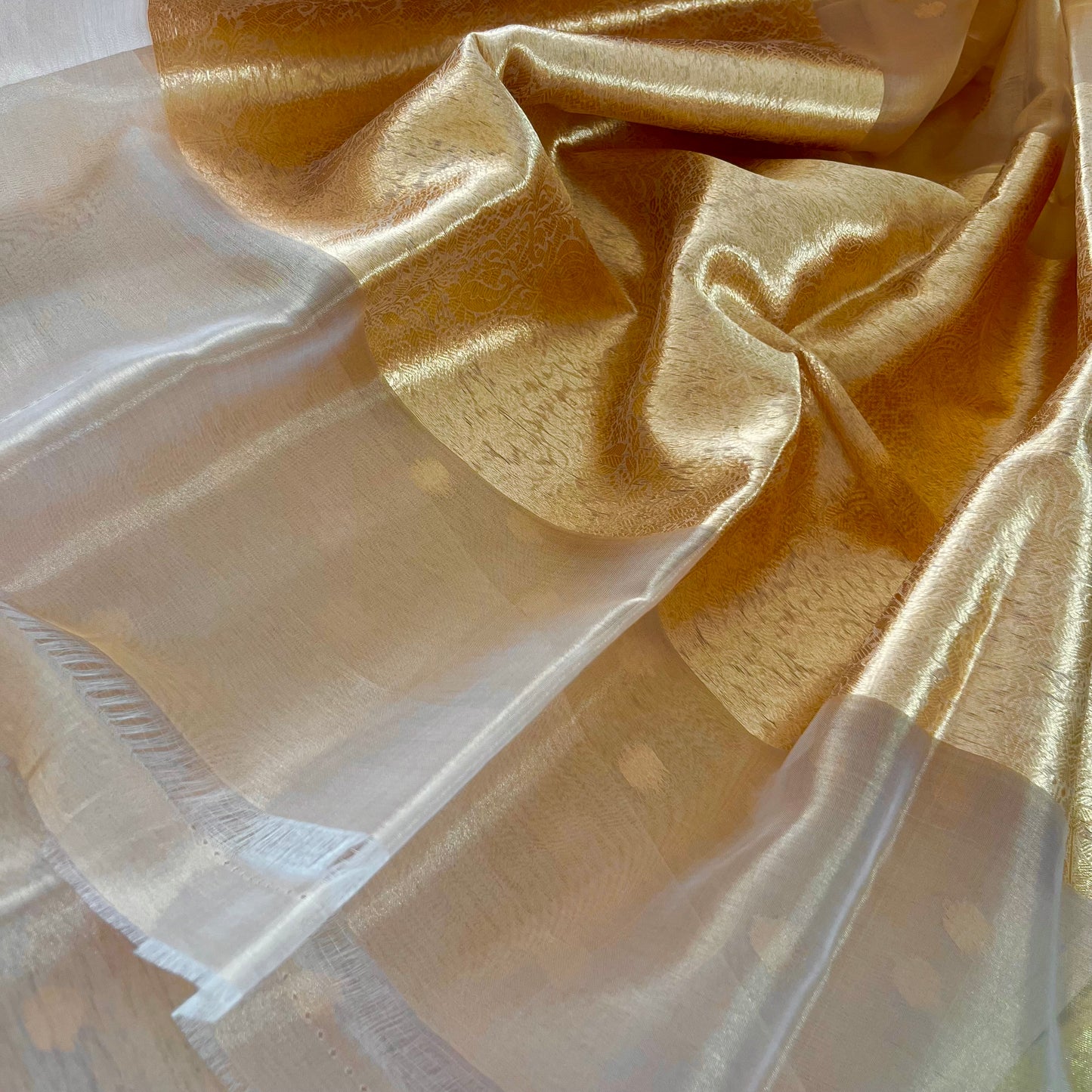 Gold Banarasi tissue silk saree with flower bootis all over