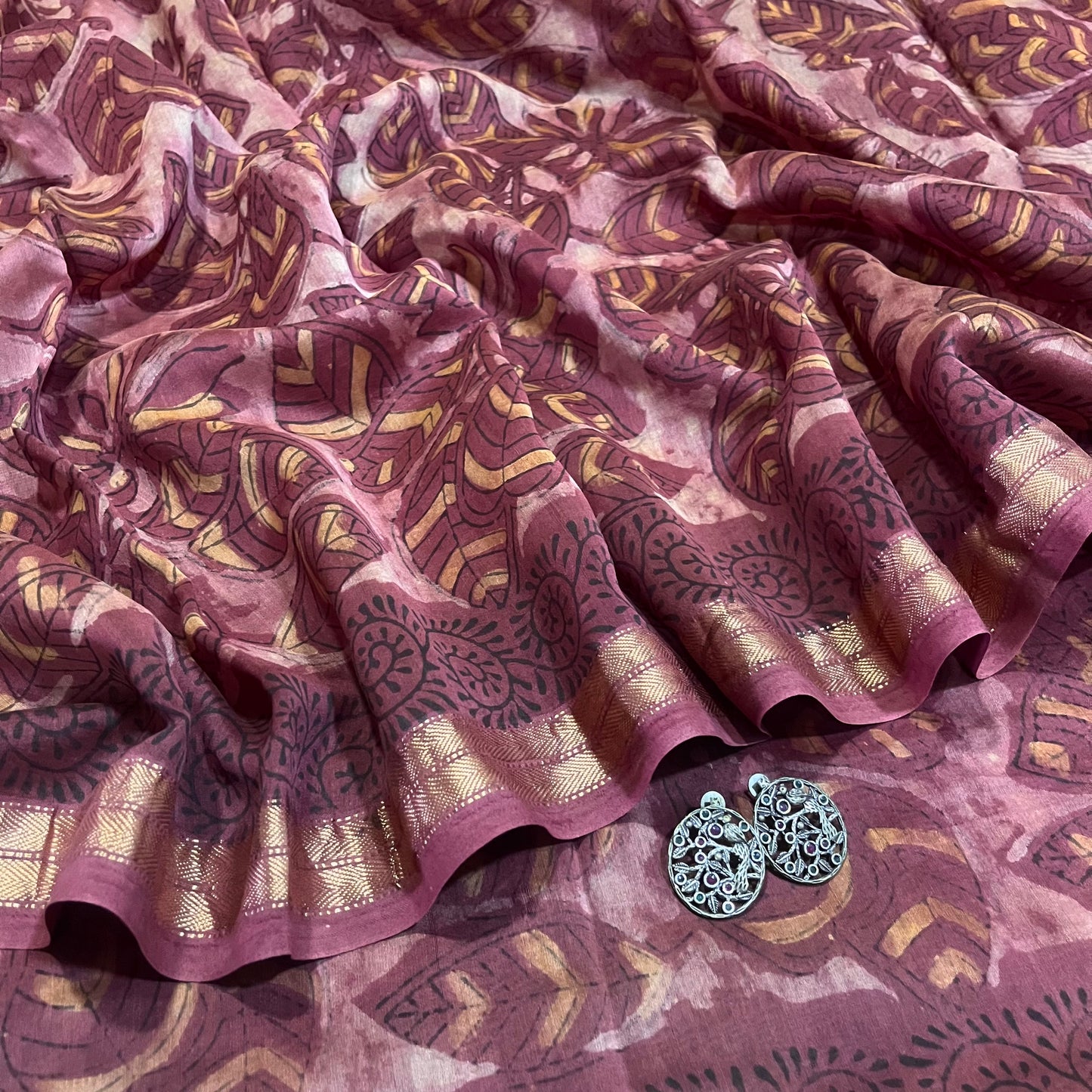Rust pink Maheshwari saree with ajrakh print all over