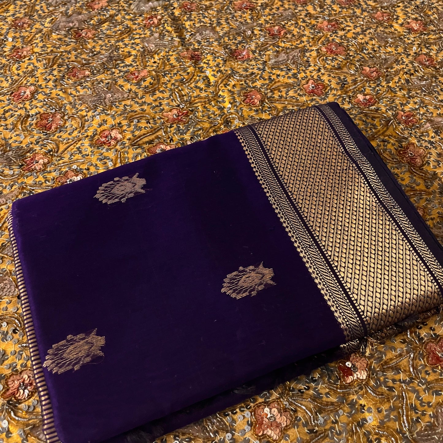 Dark purple Maheshwari saree with zari motifs all over